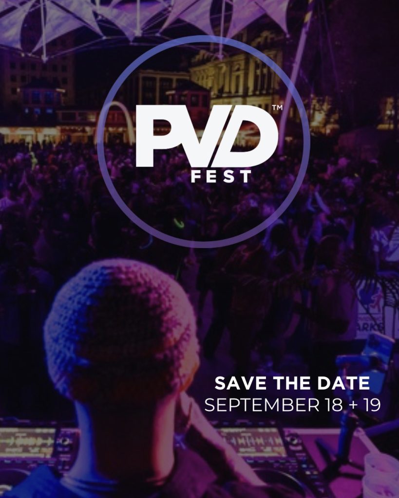 DJ performs at PVD Fest with a crowd enjoying the music. Event dates: September 18 and 19.