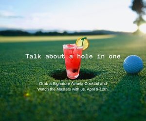 A cocktail sits beside a golf hole, promoting a Masters viewing event.
