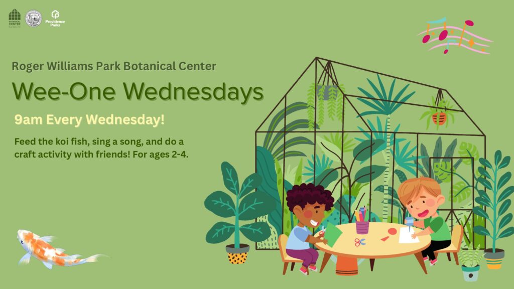 Two children engage in craft activities at a table surrounded by plants in a greenhouse setting.