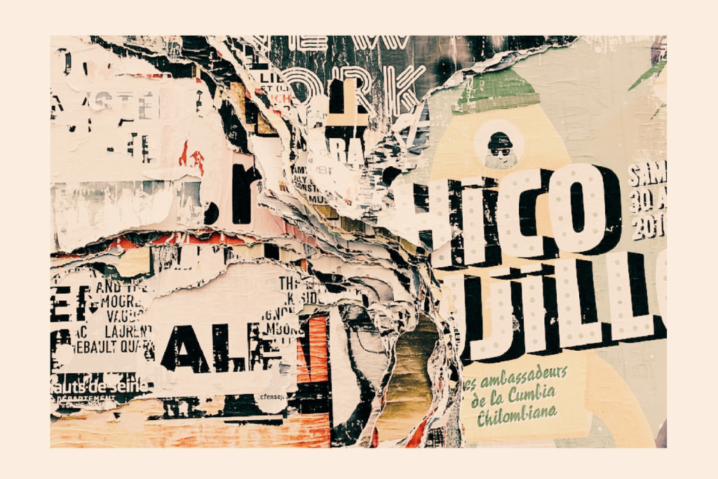 Layered and torn posters with text and graphics, creating a textured collage effect.
