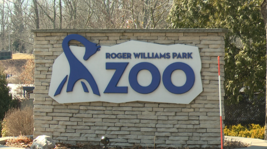 Sign for Roger Williams Park Zoo, featuring a stylized animal design and bold lettering.