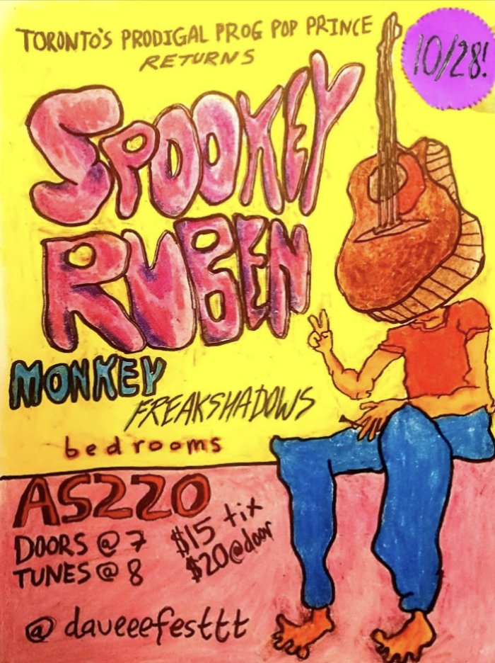Colorful concert poster featuring a cartoon figure with a guitar, promoting Spookey Ruben and other acts. Event details included.